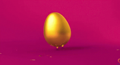 Golden Egg With Confetti On Pink Surface GIF