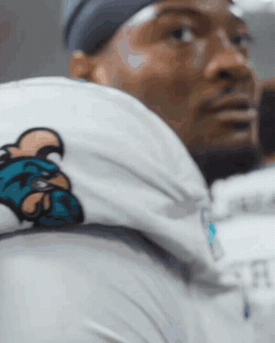Golden Flashes Football Players Lined Up In Tunnel GIF