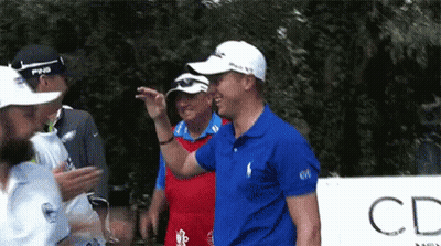 Golfers Standing In Front Of CD Sign GIF