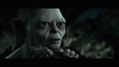 Gollum From The Lord Of The Rings Is Smiling With His Eyes Closed And His Hands On His Face GIF