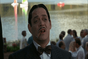 Gomez Smoking On Addams Family Thanksgiving GIF