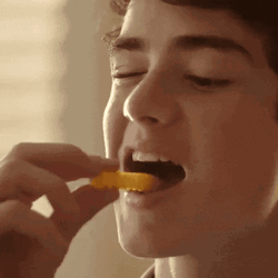 Good Looking Young Guy Enjoying Chip GIF
