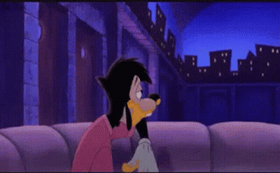 Goofy Cartoon Character Sitting On Couch With City Background GIF