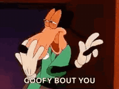 Goofy From Mickey Mouse Is Making A Peace Sign With His Hands . GIF