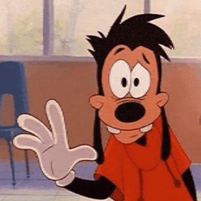 Goofy From Mickey Mouse Is Waving His Hand In A Classroom While Wearing A Glove . GIF