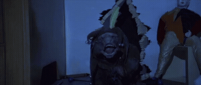 Gorilla Statue Holding Knife With Clown GIF