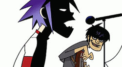 Gorillaz Giving Speech With Mic On GIF