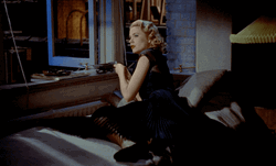 Grace Kelly Lighting A Cigarette