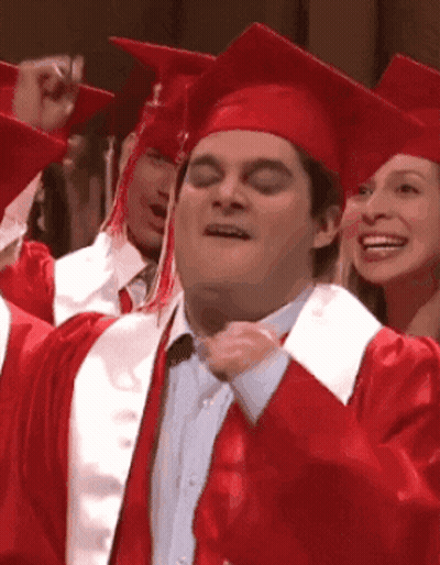 Graduates In Red Caps And Gowns Celebrating GIF