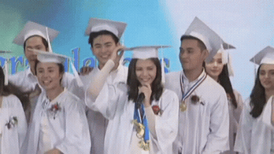 Graduates Posing With Microphone GIF