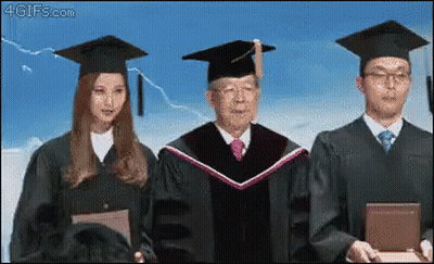Graduates Standing Together GIF
