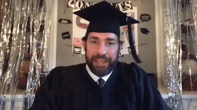 Graduation Man Sitting In Front Of Congrats Sign GIF