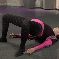 Grandma Back Stretch On Floor GIF