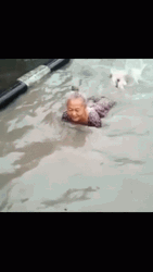 Granny Enjoying Flooded Water GIF