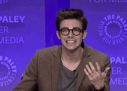 Grant Gustin Awkward Shrug GIF