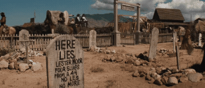 Grave Sign Saying Here Lies Lester Moor GIF