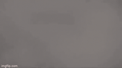 Gray Background With Triangles And Light GIF