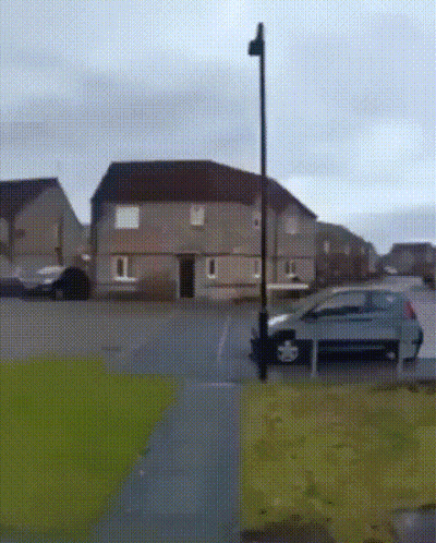 Gray Car Parked In Front Of House GIF