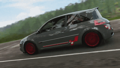 Gray Car With Red Wheels Driving