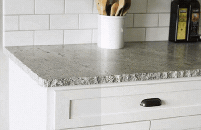 Gray Granite Countertop With White Cabinet GIF