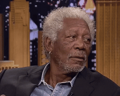 Gray Hair Man With Beard In Suit And Earrings GIF