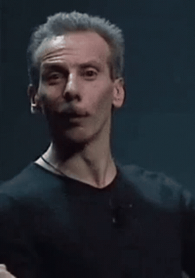 Gray-Haired Man Making Funny Face Raising Hand GIF
