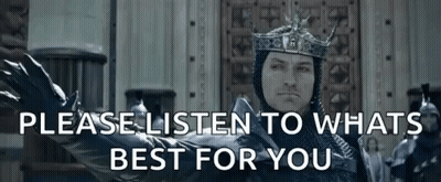 Gray Haired Man Sitting At Table Full Of Food GIF