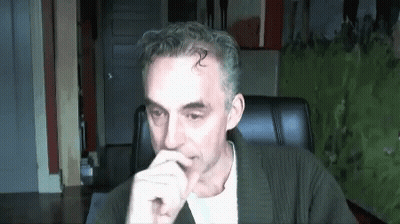Gray-Haired Man With Hand To Mouth GIF