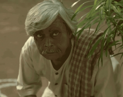Gray-Haired Man With Mustache Praying GIF
