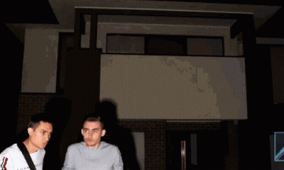Gray Shirt Man Beside Blue Shirt Man GIF