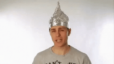 Gray Shirt Man Tin Foil Hat Making Face GIF
