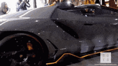 Gray Sports Car Parked By 30 TS Sign GIF