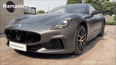 Gray Sports Car With Namaste Logo GIF