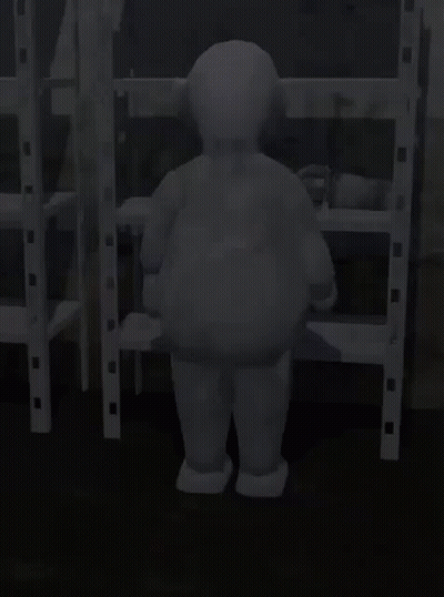 Gray Teletubbies Character Standing In Front Of Shelves GIF