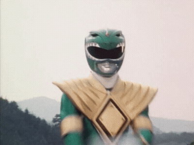 Green And Gold Power Ranger Standing In Field GIF