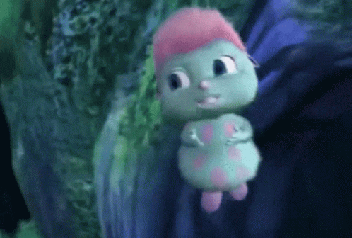 Green And Pink Cartoon Character With Headband GIF