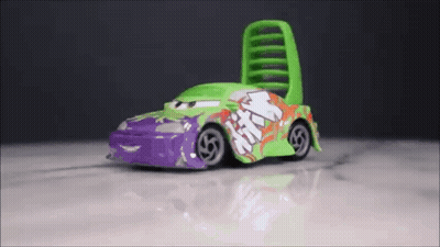 Green And Purple Toy Car With Graffiti GIF