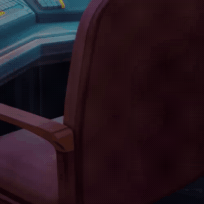 Green Apple On Chair Next To Coffee Mug GIF