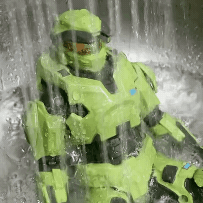 Green Armored Figure Sitting In Sink GIF