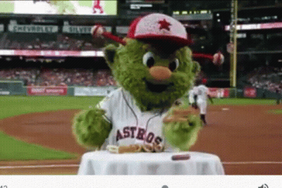 Green Astros Mascot Eating Hot Dog GIF