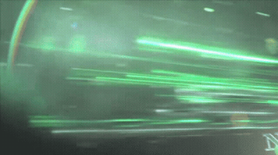 Green Background With Rainbow And Letter N GIF