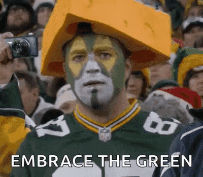 Green Bay Packers Fan in Cheese Hat Taking Selfie