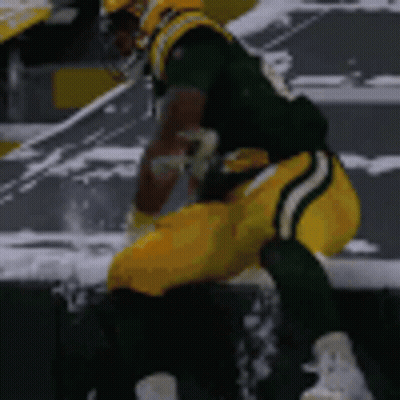 Green Bay Packers Player Kneeling On Field GIF
