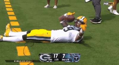Green Bay Packers Player Laying On Field Score 17 7 GIF