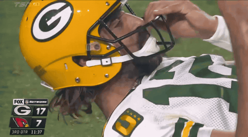 Green Bay Packers Player Lying On Field GIF