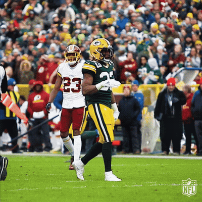 Green Bay Packers Player Number 25 Walking On Field GIF