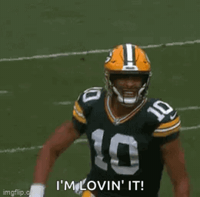 Green Bay Packers Player Running Saying I'm Loving It GIF