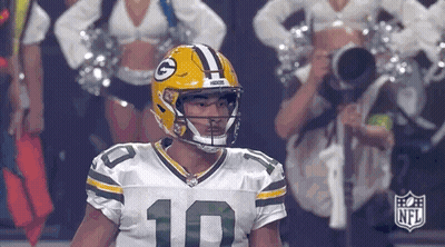 Green Bay Packers Player Sitting With Cheerleaders GIF