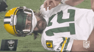 Green Bay Packers Player With Mask And Number 21 GIF
