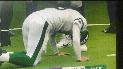 Green Bay Packers Player With Mask And Number 21 GIF